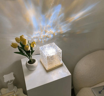 Modern bedroom setup with RGB water ripple night light creating aesthetic ambient lighting for relaxing atmosphere