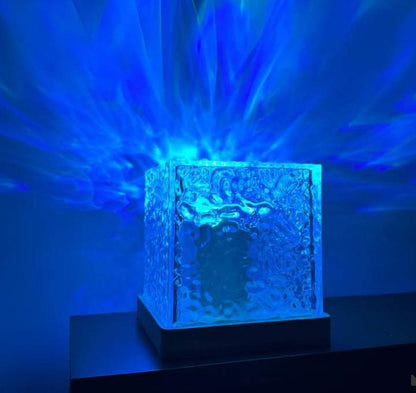 Close-up view of USB touch control crystal flame lamp displaying colorful rotating water ripple light effect
